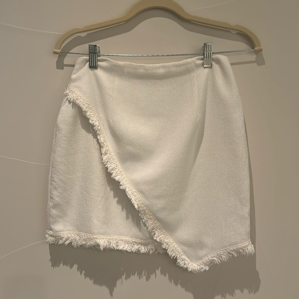 By the way - white polyester skirt